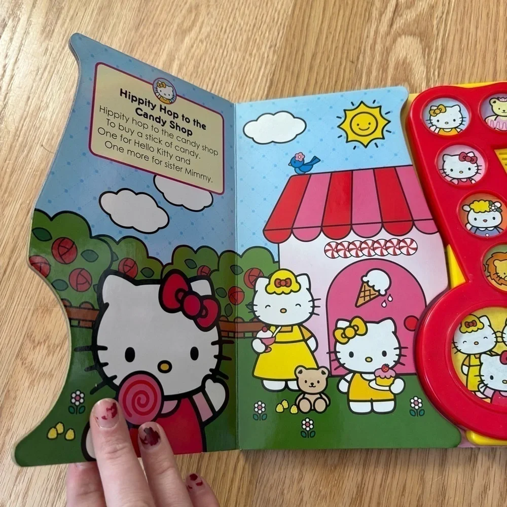 Hello Kitty Sweet Songs Musical Book Red and Yellow Hardcover